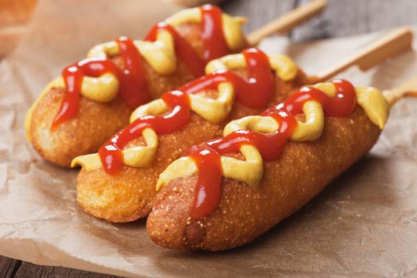 corndogs with mustard and ketchup