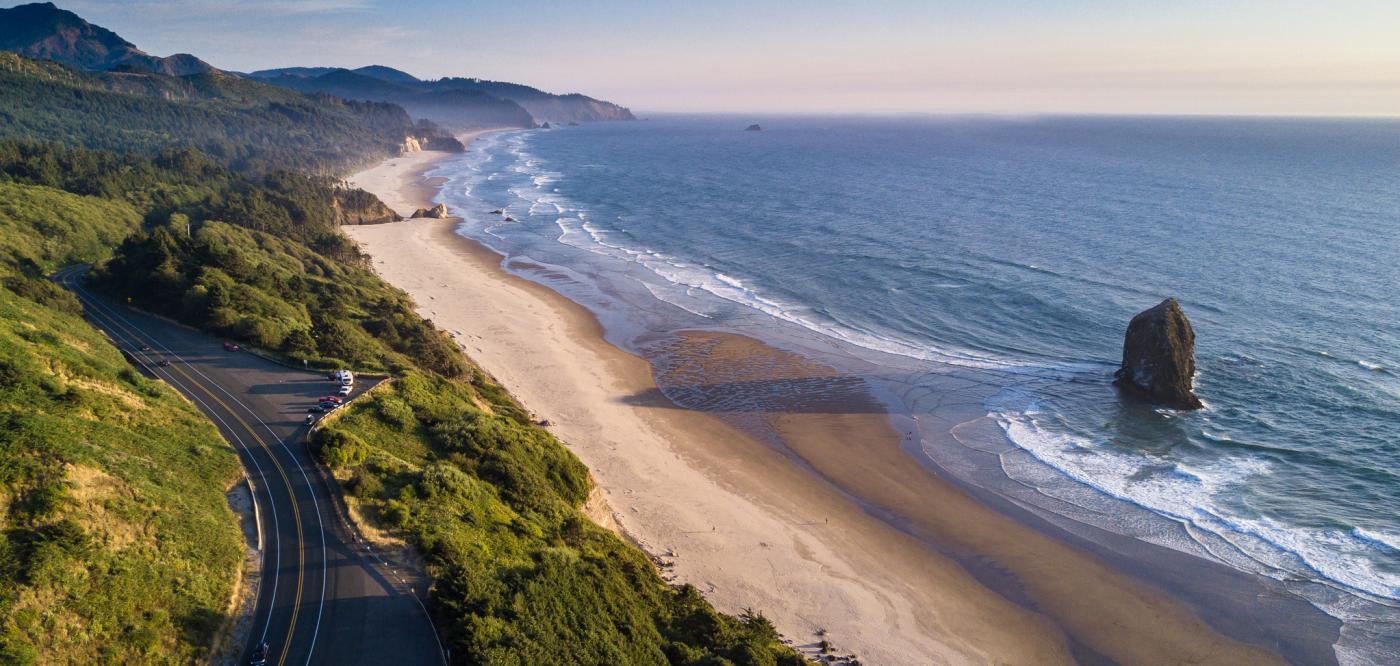 An aerial view of Highway 101 along side an Oregon beach